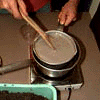 place pan into double-boileran start to slowly stir