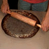 now, take your hands or a rolling pin, and flatten